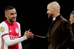 Hakim Ziyech shaking hands with new Manchester United boss Erik Ten Hag, during their days at Ajax
