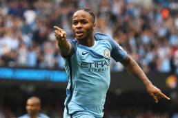Raheem sterling pointing as he celebrates a goal for Manchester City.