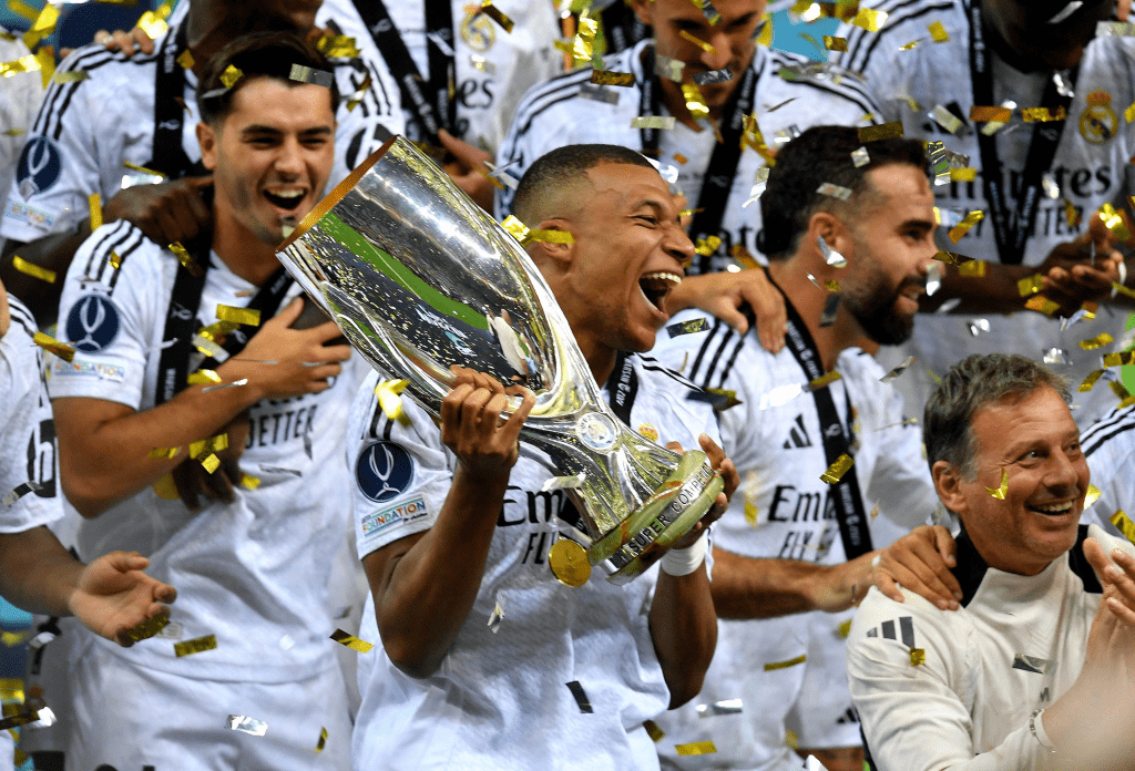 Real Madrid forward Kylian Mbappe lifts the UEFA Super Cup